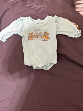 Carhartt infant long-sleeve bodysuit featuring a harvest-themed Size 3 M